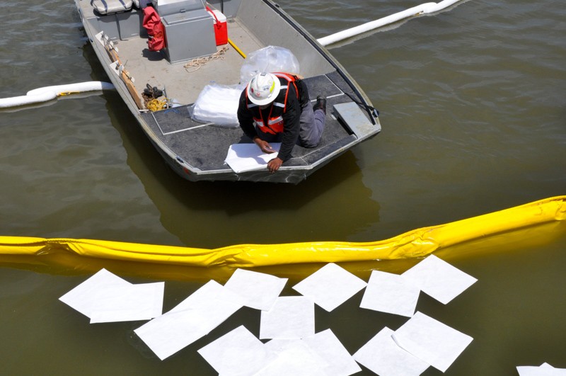 Oil-Only Pads Environmental Application, with Boat